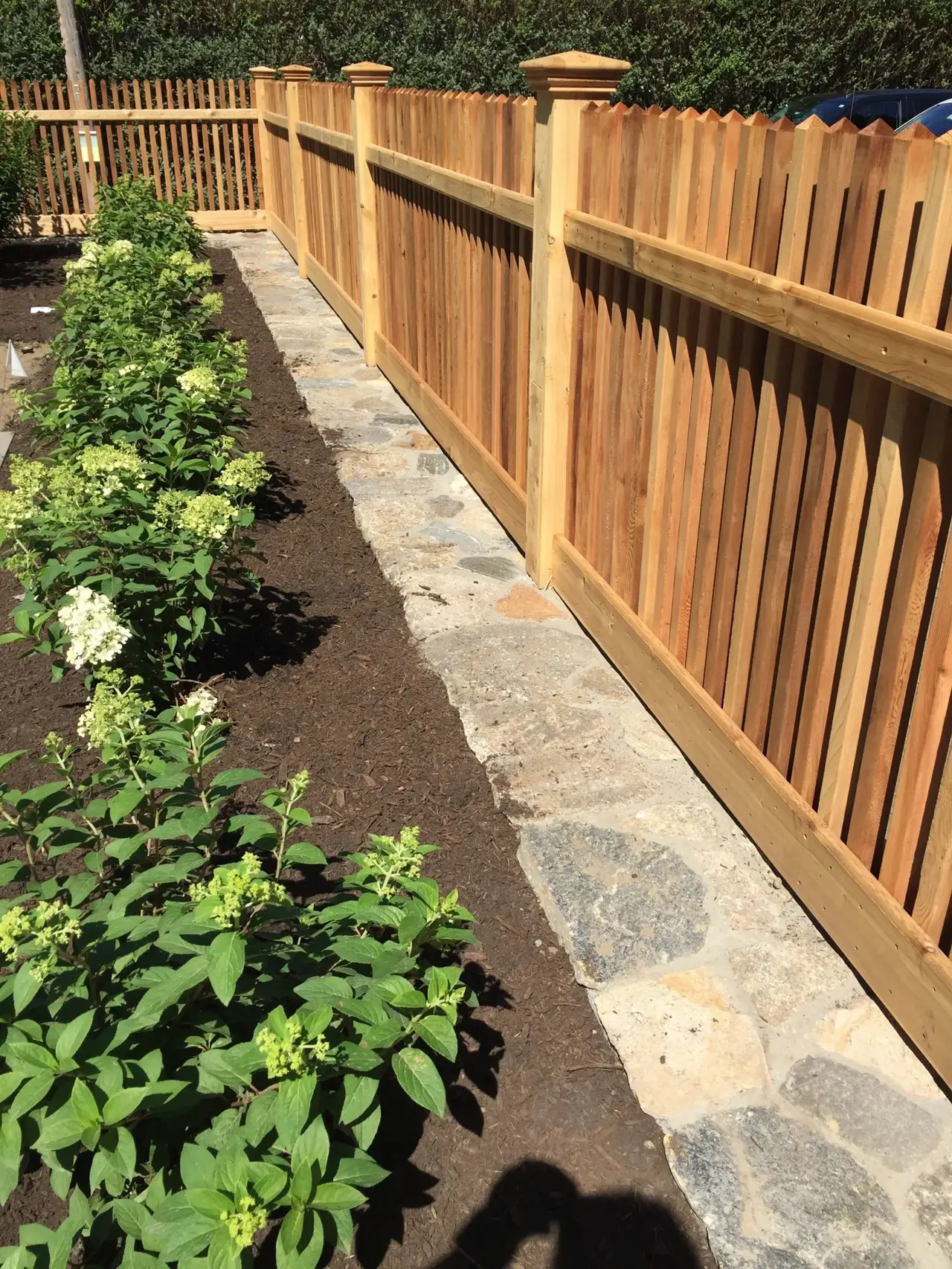 Custom cedar fence installed by Armstrong Fence on the South Shore of Massachusetts