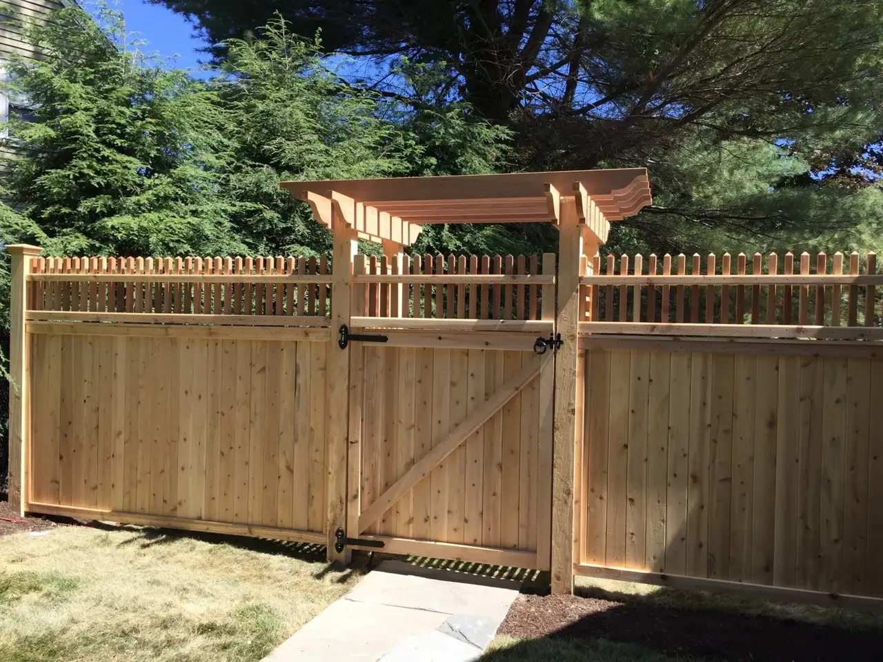 Custom cedar fence installed by Armstrong Fence on the South Shore of Massachusetts