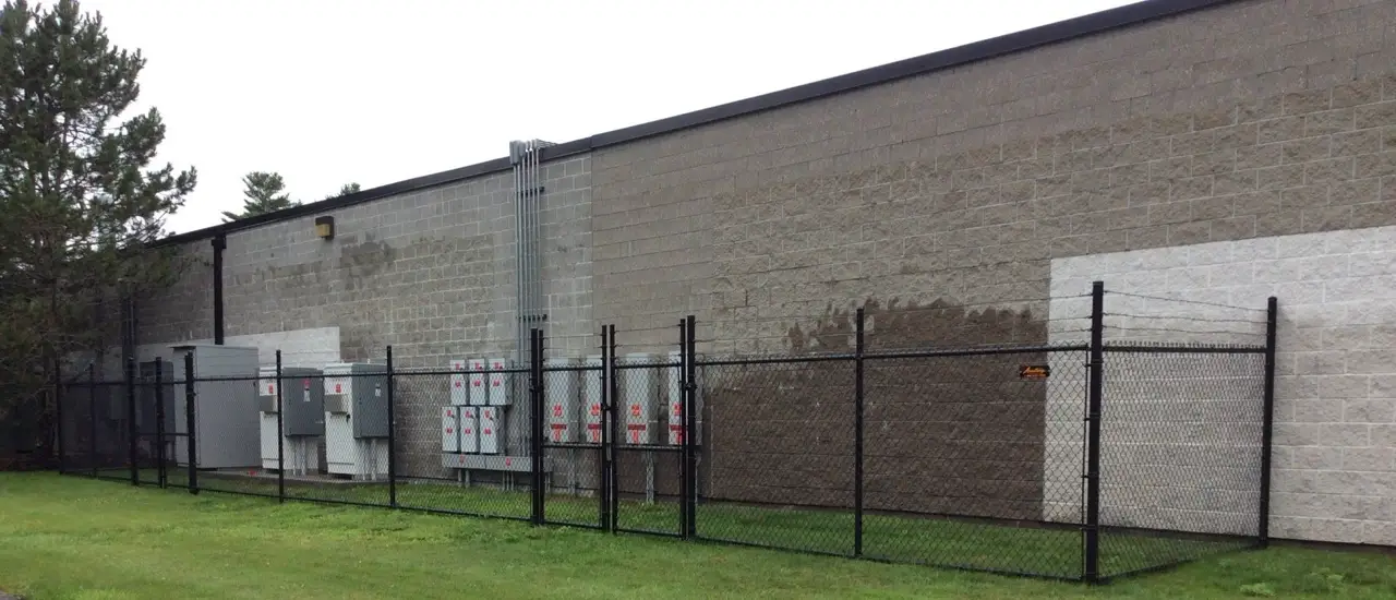 Enclosures chain link fence installed by Armstrong Fence on the South Shore of Massachusetts