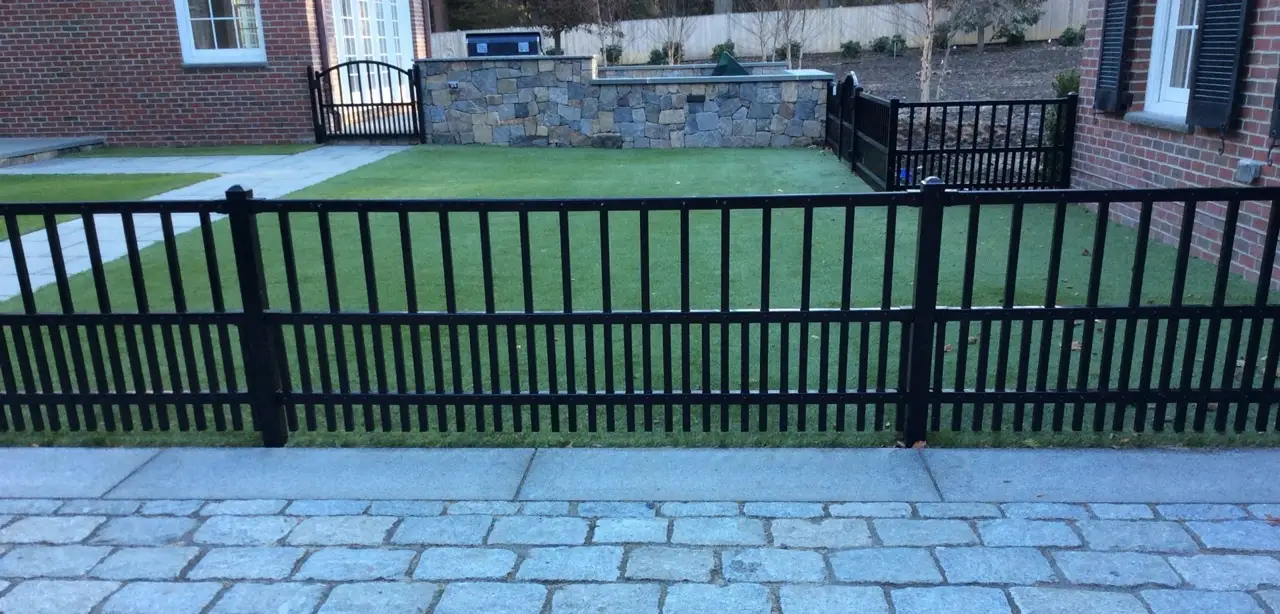 Ornamental aluminum fence installed at a coastal home on the South Shore