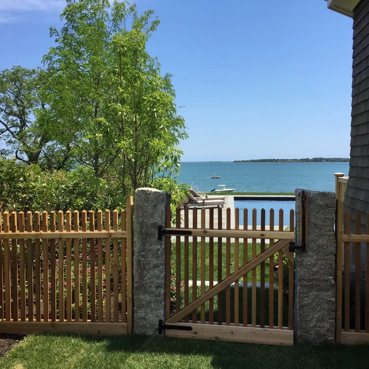 Custom cedar fence installed by Armstrong Fence on the South Shore of Massachusetts