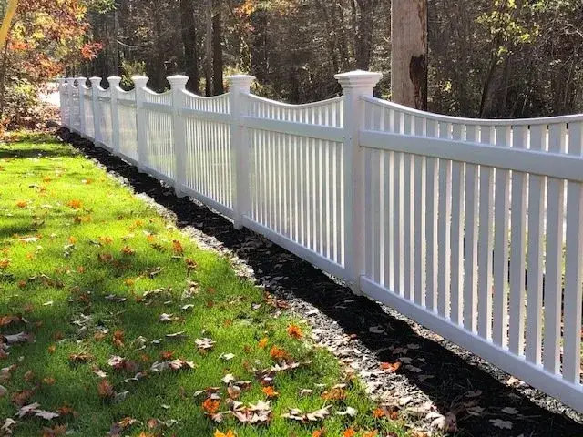 Ellisville vinyl fence installed on a residential property in Marshfield, Massachusetts